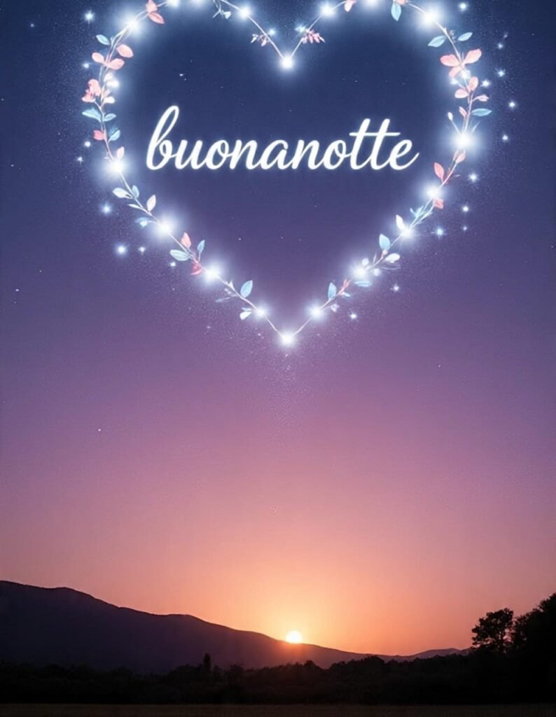 Nel cielo dopo il tramonto appare una forma di cuore luminosa fatta di foglie brillanti. Sotto è scritto buonanotte