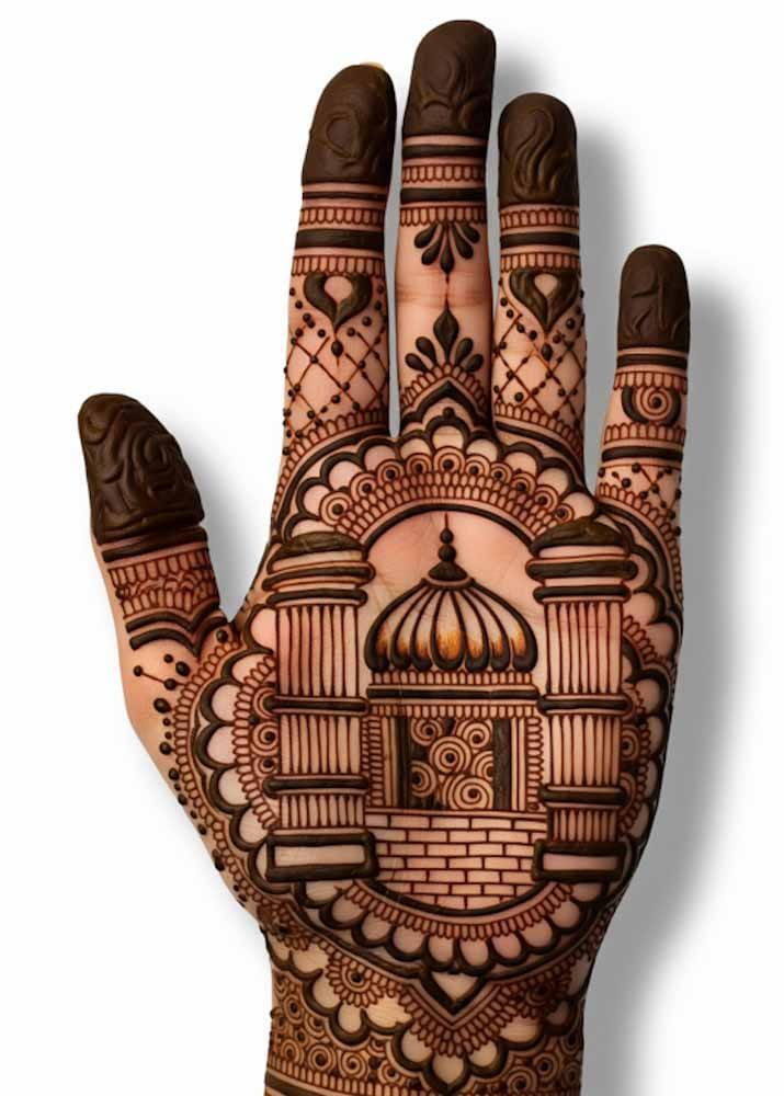 Minimalist front hand mehndi with small flowers
